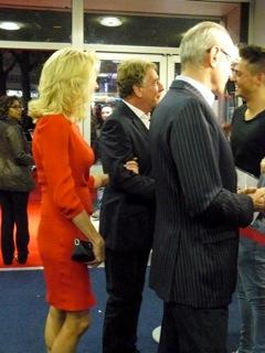 Francis being interviewed, with Rick in background